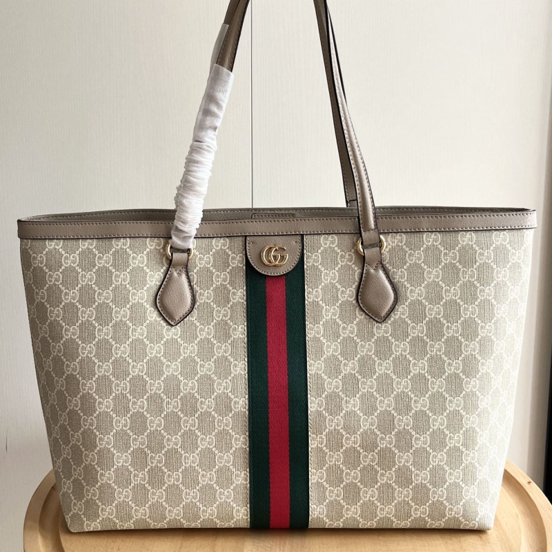 G*u*i shopping bags